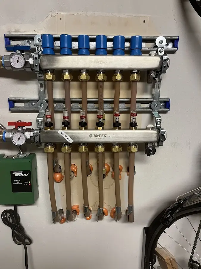 Plumber performing Sink Repair at a residential property in South Russell